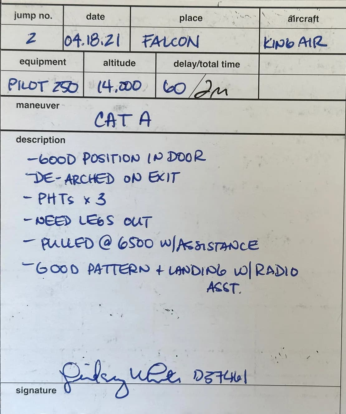 Handwritten logbook card for jump 2, 04.18.21, from a King Air at 14,000 feet, with instructor notes on the exit, a pull at 6,500 feet and a radio-assisted landing.
